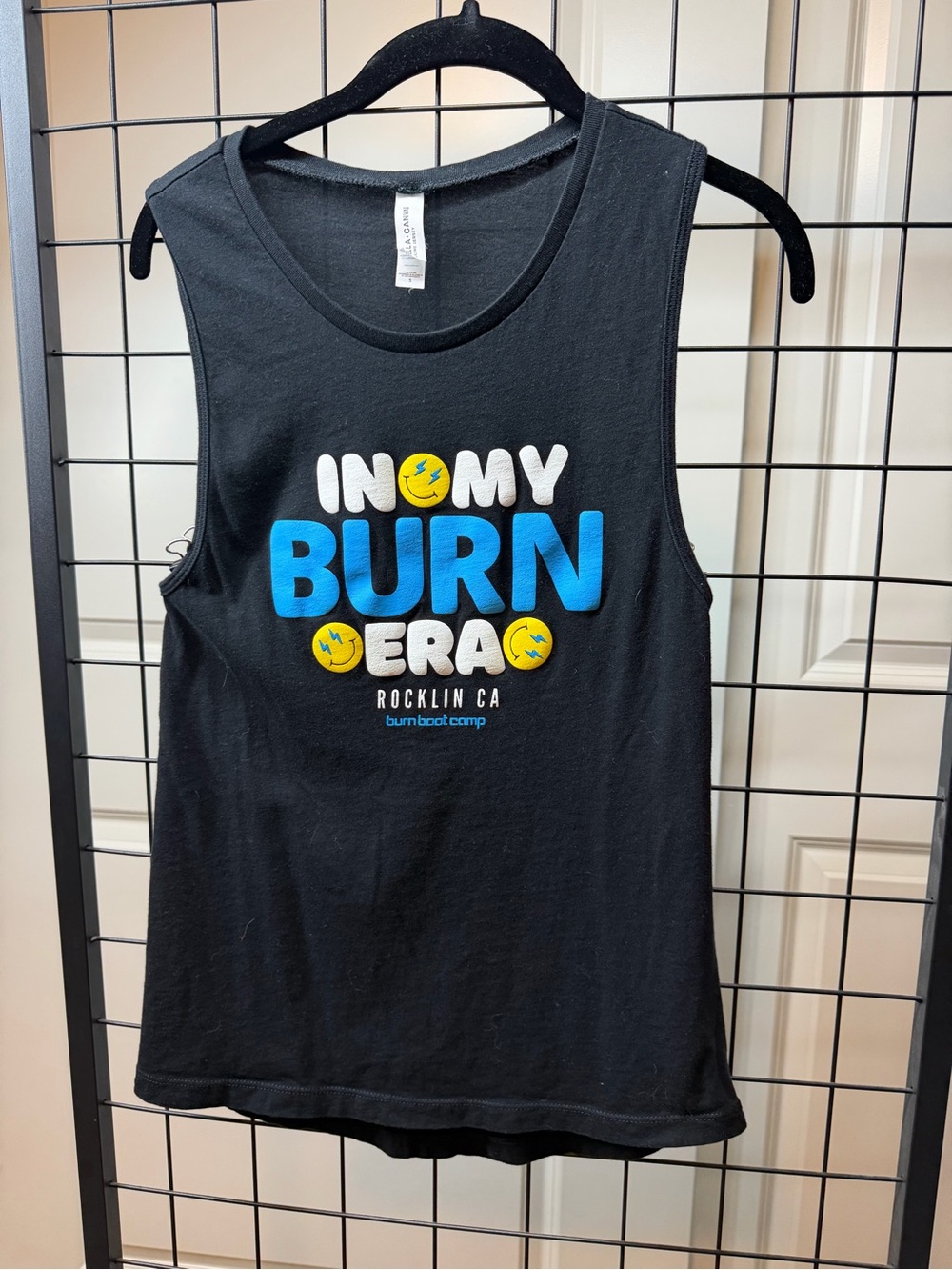 Burn Boot Camp in my Burn Era Black Tank with Blue and Yellow Graphic Text